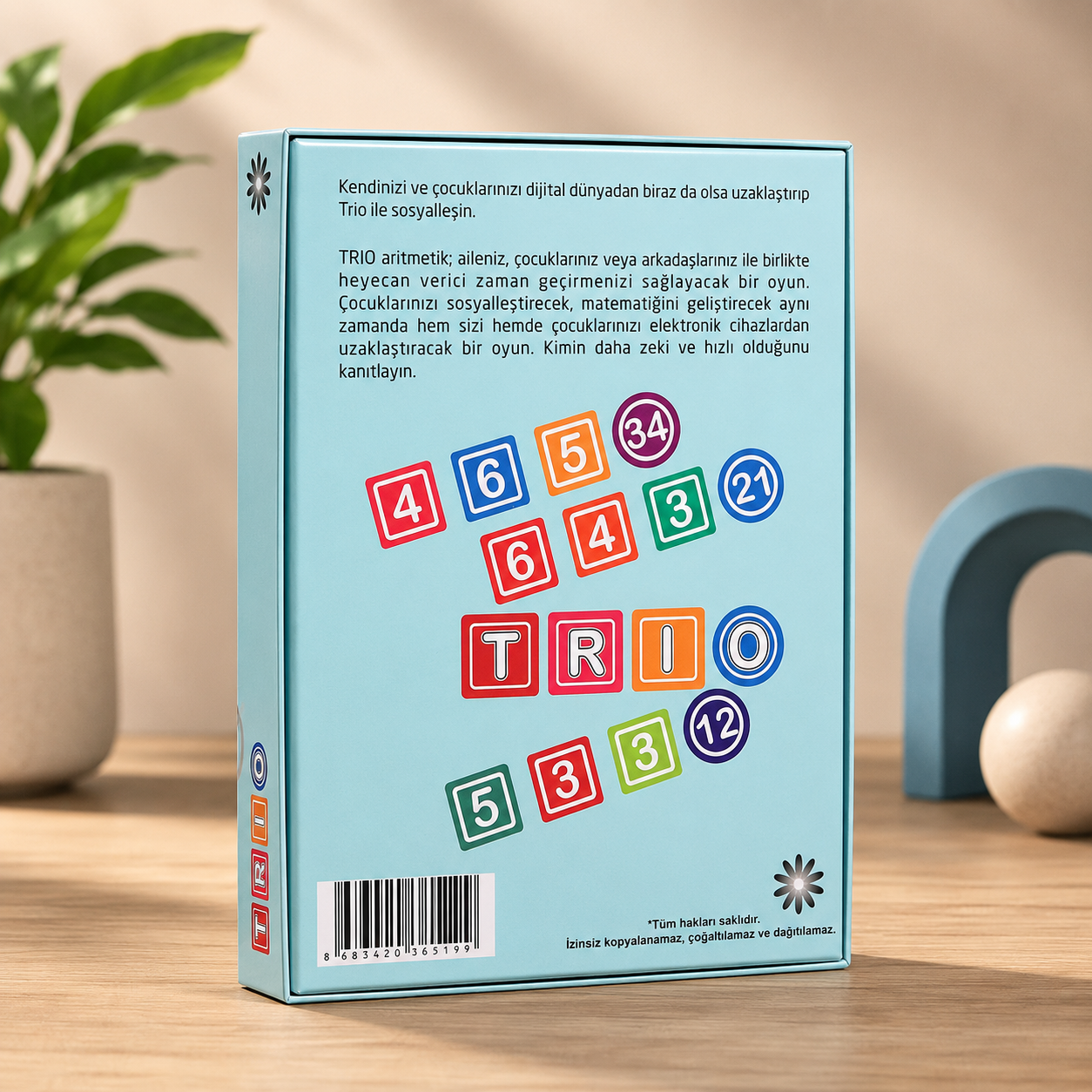 Back view of the Trio game box